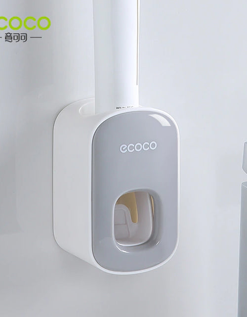 Load image into Gallery viewer, ECOCO Automatic Toothpaste Dispenser Wall Mount Bathroom Bathroom Accessories Waterproof Toothpaste Squeezer Toothbrush Holder
